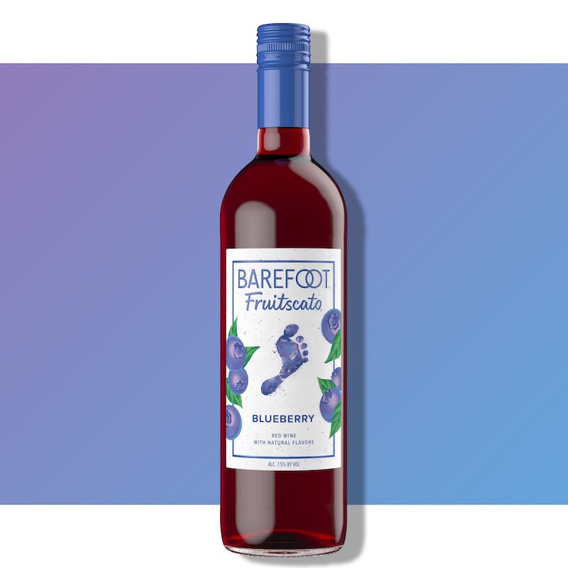 Barefoot Fruitscato Blueberry bottle against a blue and purple gradient background with blueberry imagery on the label