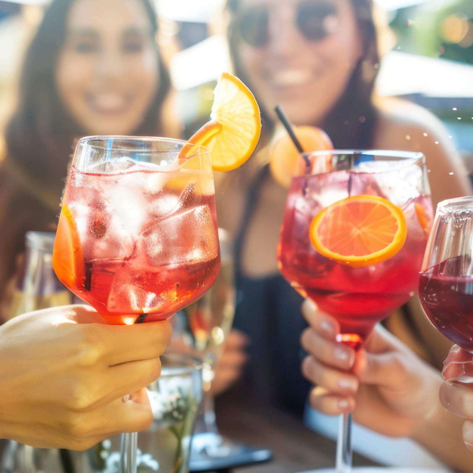 Friends toasting with Barefoot Fruitscato